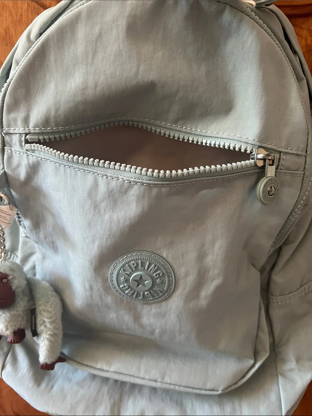 Kipling Light Blue  Backpack with Monkey Keychain